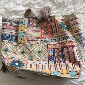 Johnny Was back pack missing one handle